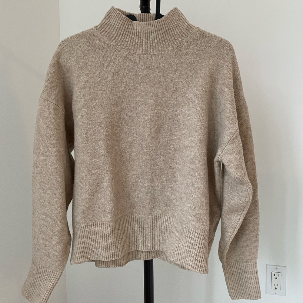 Cream sweater